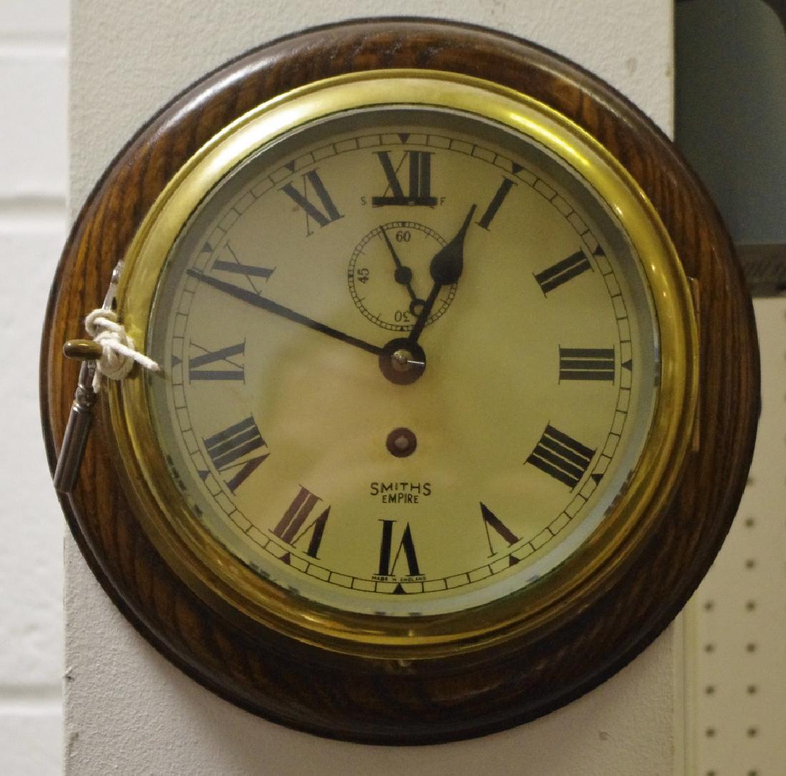 A brass cased ships clock, Smiths Empire