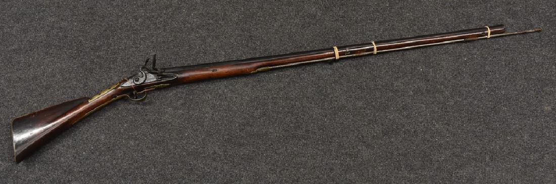 An 18th century flintlock sporting rifle, 99.5cm: An 18th century flintlock sporting rifle, 99.5cm barrel, steel ram rod, engraved brass trigger guard and lockplates, walnut full stock inlaid with silver wire, 138cm long overall, c.1770 (old repairs)
