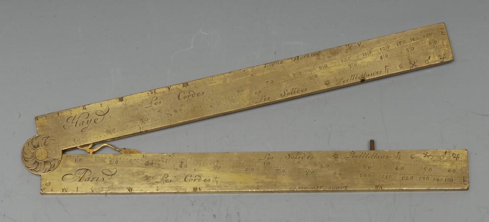 An early 18th century French brass folding square or: An early 18th century French brass folding square or sector, by Haye, Paris, marked out and inscribed Les Parties Egalles, opening to 33cm long, c.1715