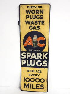 1935 A-C Spark Plugs sign: 19"x30" 1935 SST embossed A-C Spark Plugs sign -Fair with lots of wear