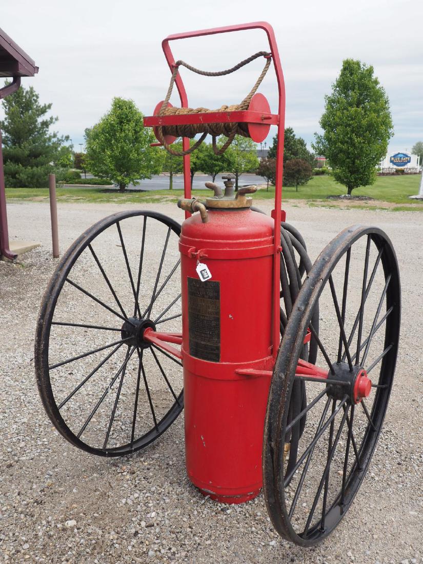 Early Ajax Soda Acid fire fighting cart: Early, 2-wheel, man-powered Ajax Soda Acid fire fighting cart with hose and nozzle