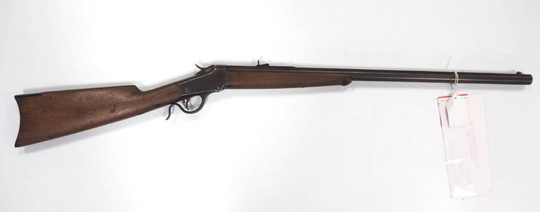 Winchester Model 1885 .32 cal. long: Winchester Model 1885 .32 cal. long, serial #34923 -Wood stock has crack, otherwise Good