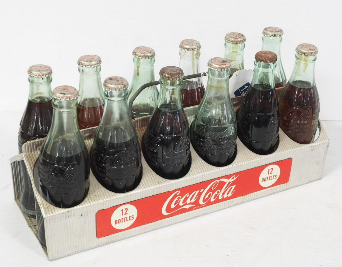 Coca Cola bottle carrier with bottles: Metal 12-pack Coca Cola bottle carrier with (12) glass bottles