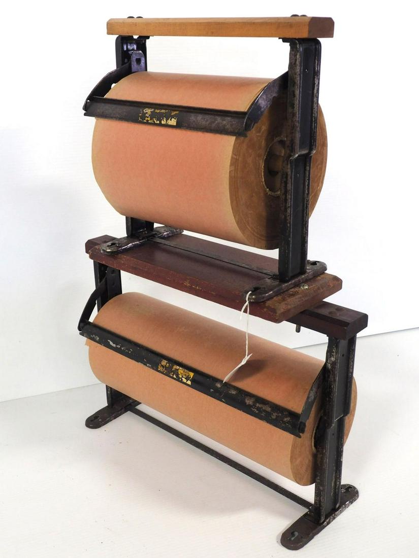 Country store double paper cutter: Country store double paper cutter with rolls of paper, 10" and 16" wide, mfg in Grand Rapids