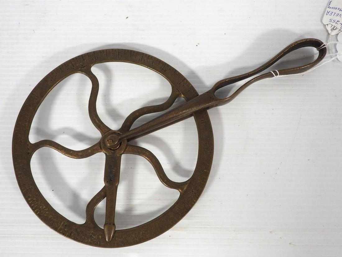 Brass wheel measurer (1 of 3)