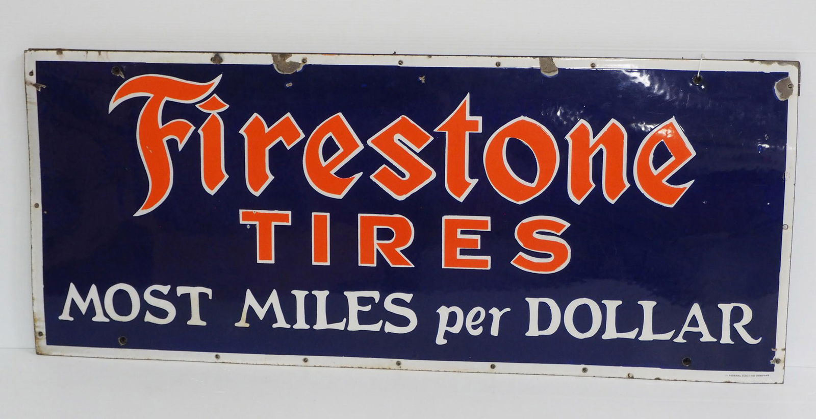 Firestone Tires "Most Miles Per Dollar" sign (1 of 5)