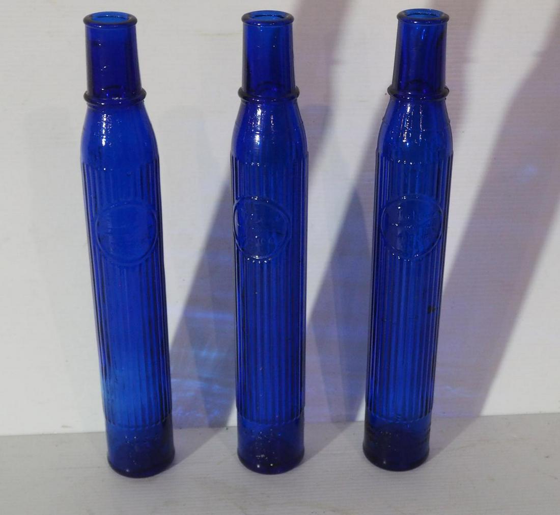 (3) Blue glass Tiolene oil bottles (1 of 1)