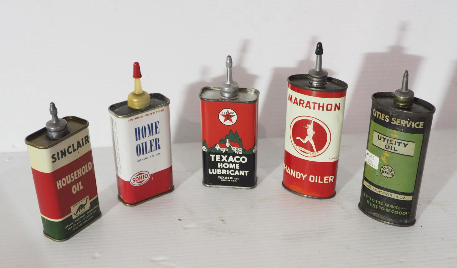 (5) Small household oil tins (1 of 2)