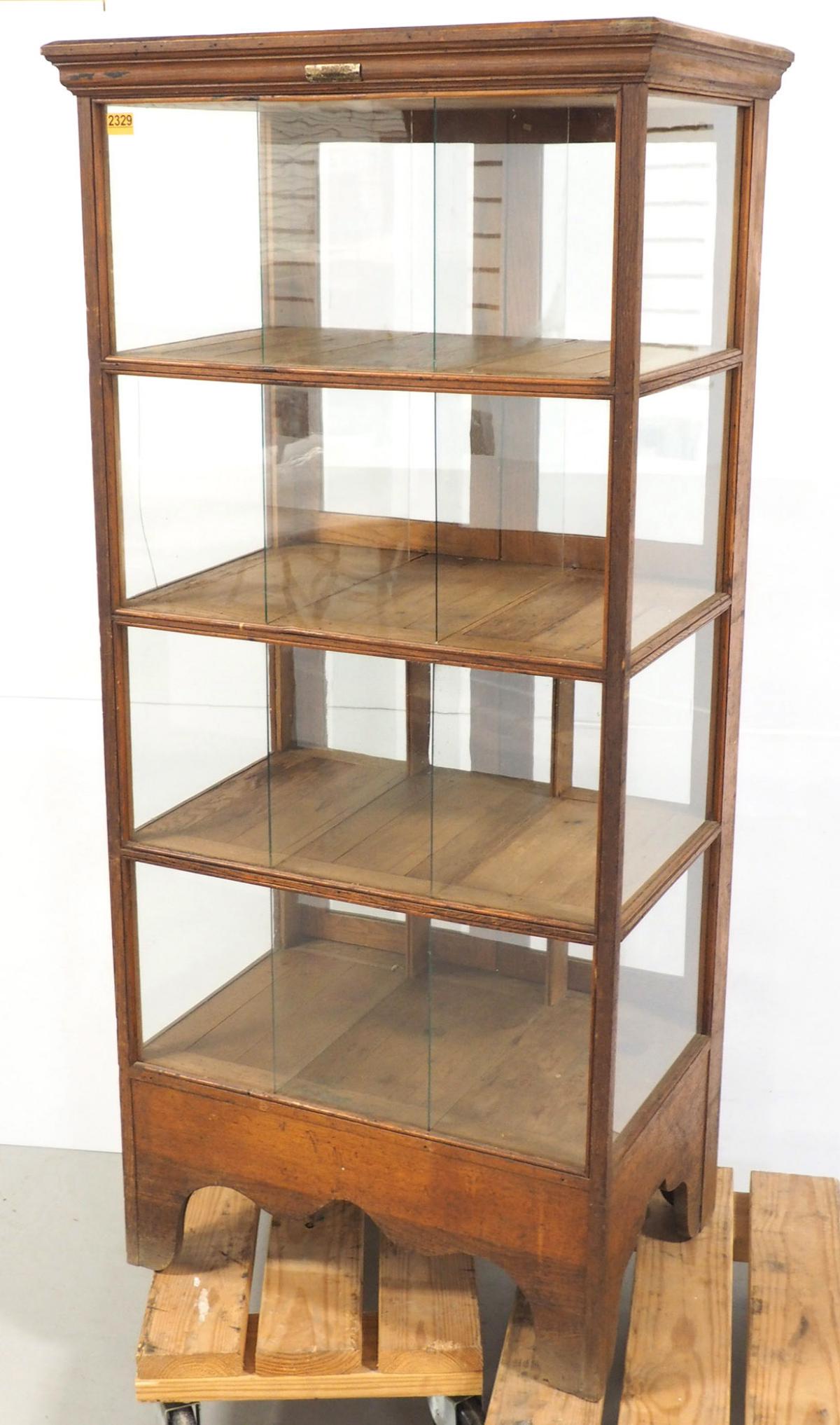 Country store bakery display case: 30"x65"x21" oak and glass country store bakery display case with makers tag. Pick-up only.