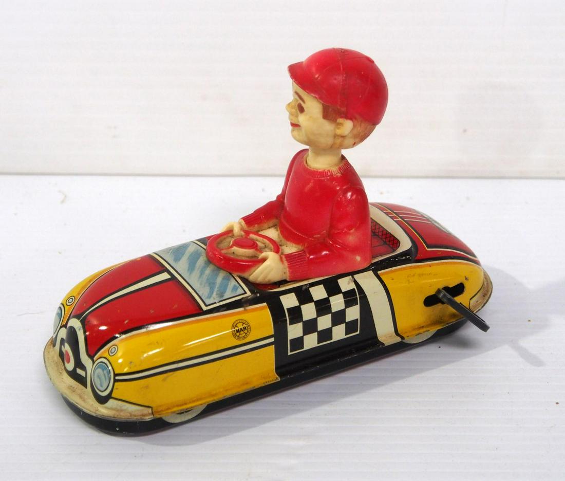 Marx bobble head driver in race car (1 of 2)