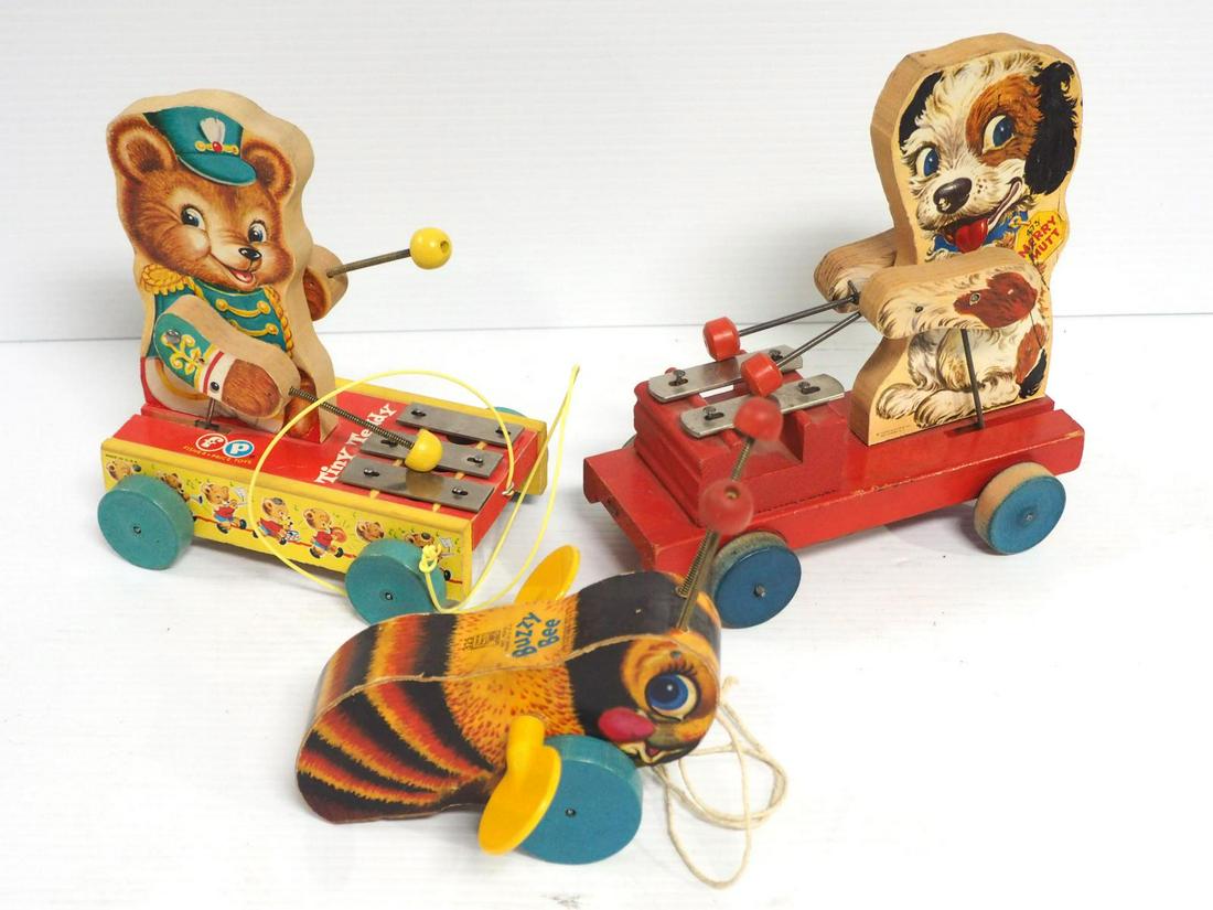 (3) Fisher Price pull toys: Fisher Price #473 "Merry Mutt" xylophone pull toy, Fisher Price "Tiny Teddy" xylophone pull toy & Fisher Price #325 "Buzzy Bell" pull toy -All in good working condition