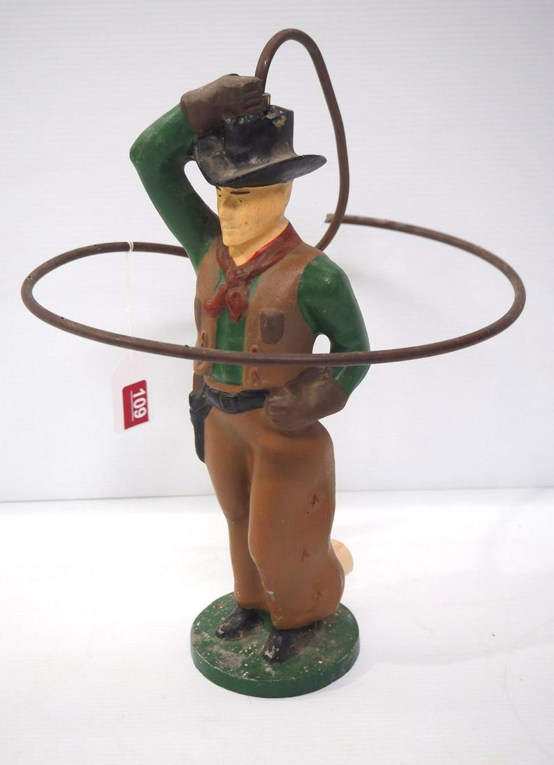 Cast iron cowboy-shaped lawn sprinker (1 of 4)