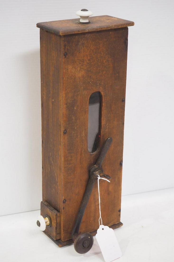 Unusual primitive coffee grinder (1 of 2)