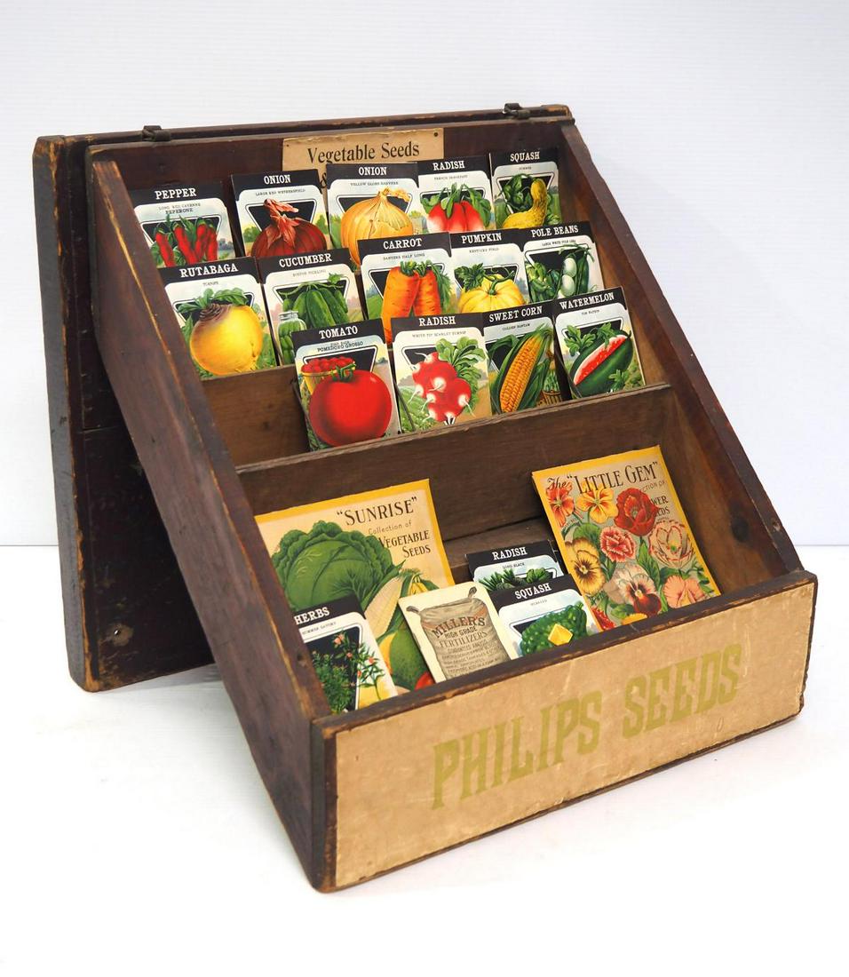 Seed shipping box/display rack: Wooden seed shipping box/display rack marked J.M. Philips Seed Co. of Mercerburg, PA with seed packets