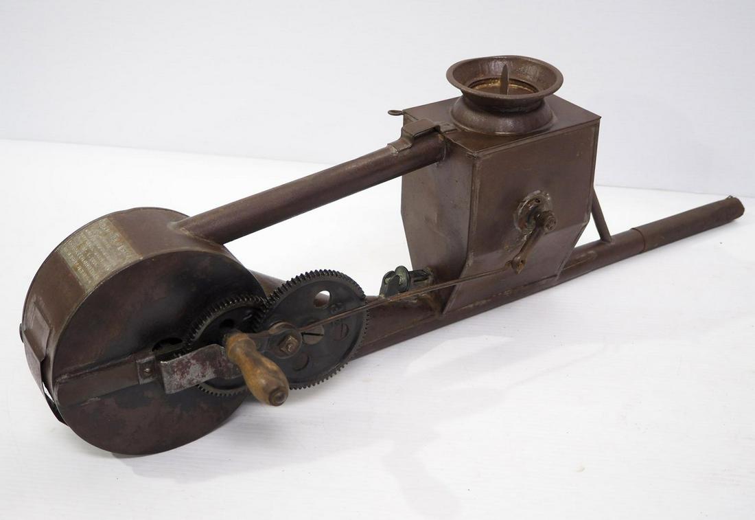 Tin, hand-crank Champion duster (1 of 4)