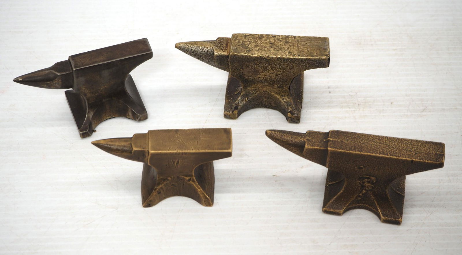 (4) Small Brass Anvils (1 of 2)