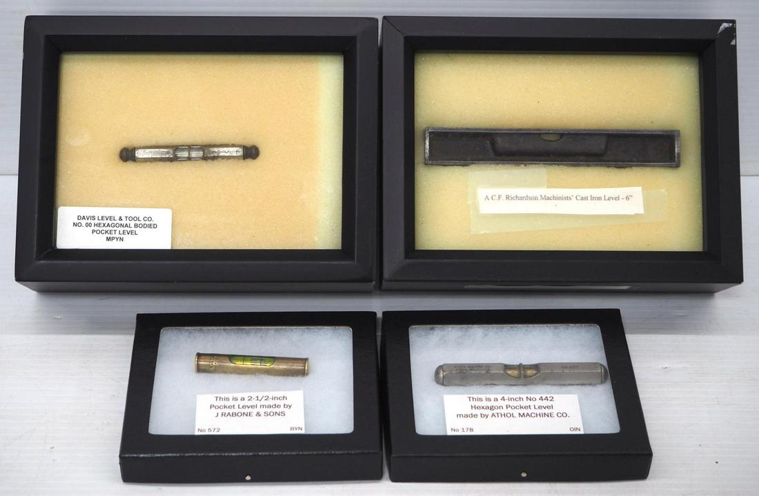 (4) Small Levels in display cases (1 of 5)