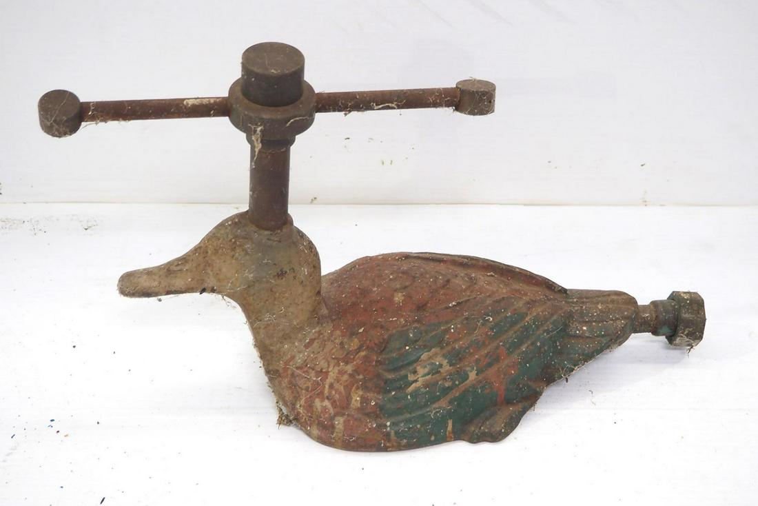 Cast iron duck sprinkler (1 of 2)