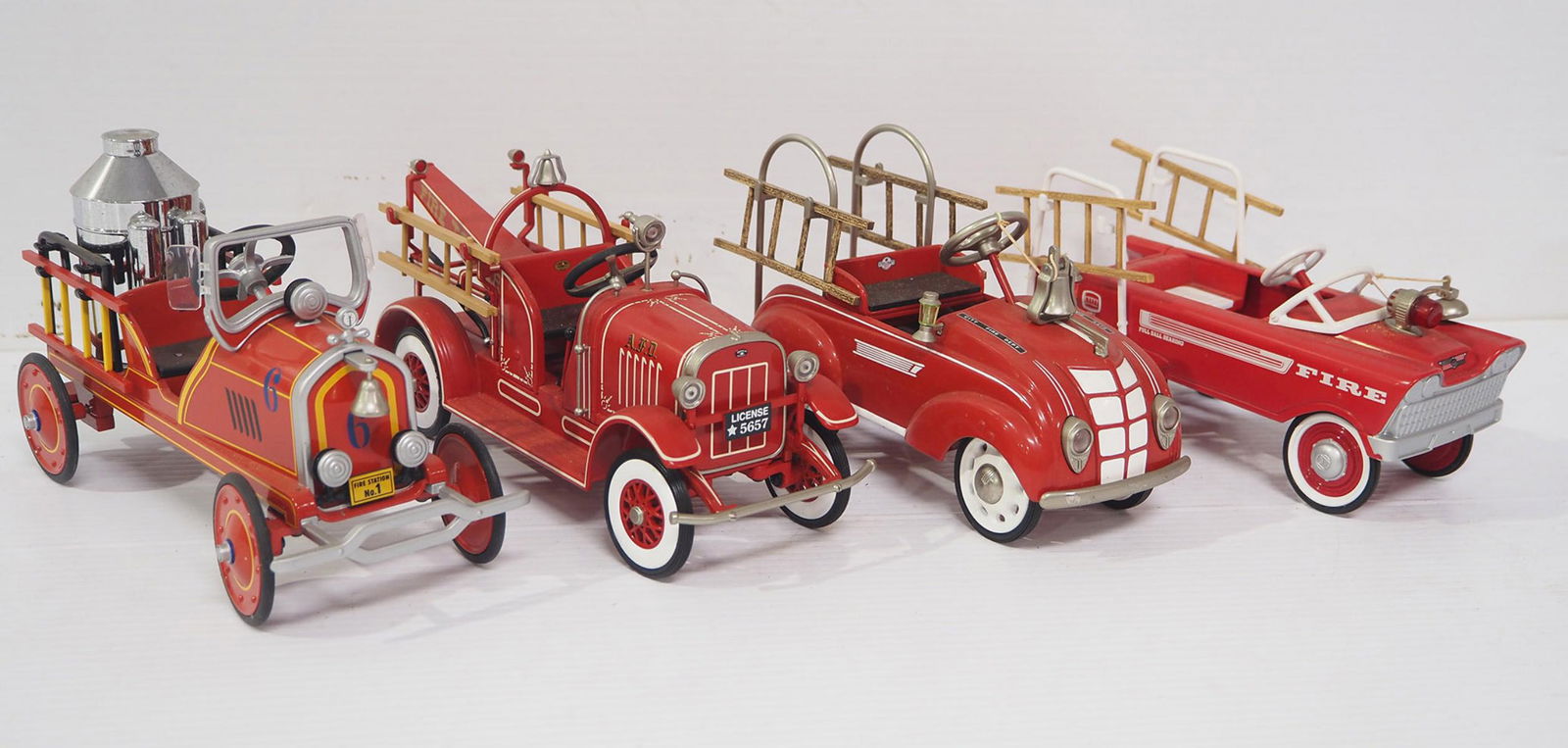 (4) Hallmark Classics Pedal Fire Trucks (1 of 5)