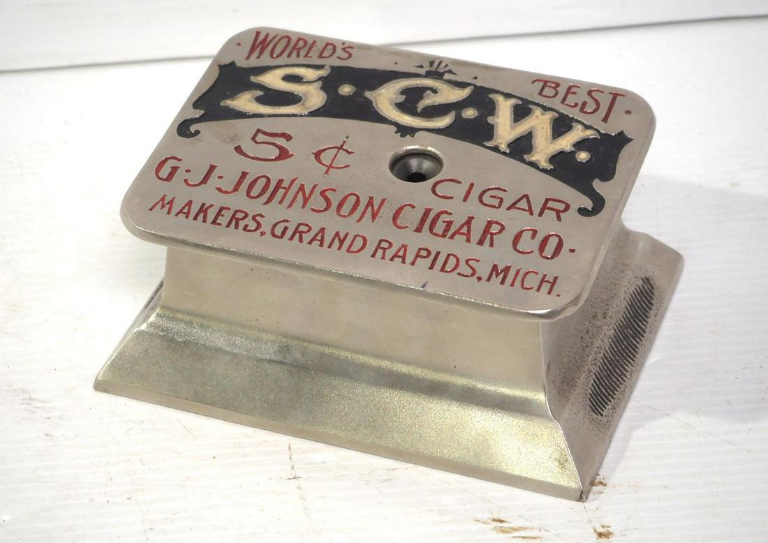 S.C.W. 5-cent wind-up cigar cutter (1 of 2)