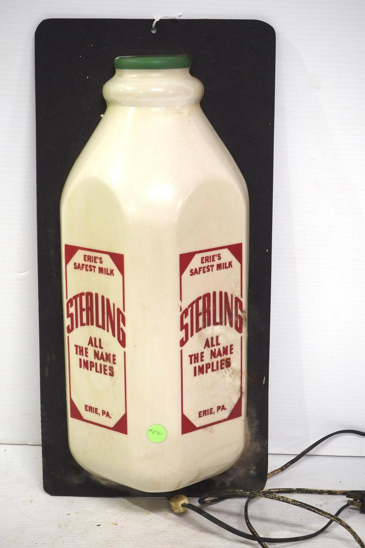Lighted Sterling Milk sign: 10"x21" plastic lighted Sterling Milk sign -Works! Bottle has 2" crack & is detached from mastonite back