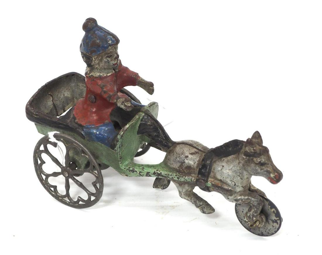 Nice old bell toy with woman in cart: Nice old bell toy with woman in cart, 6½"L -Very Good