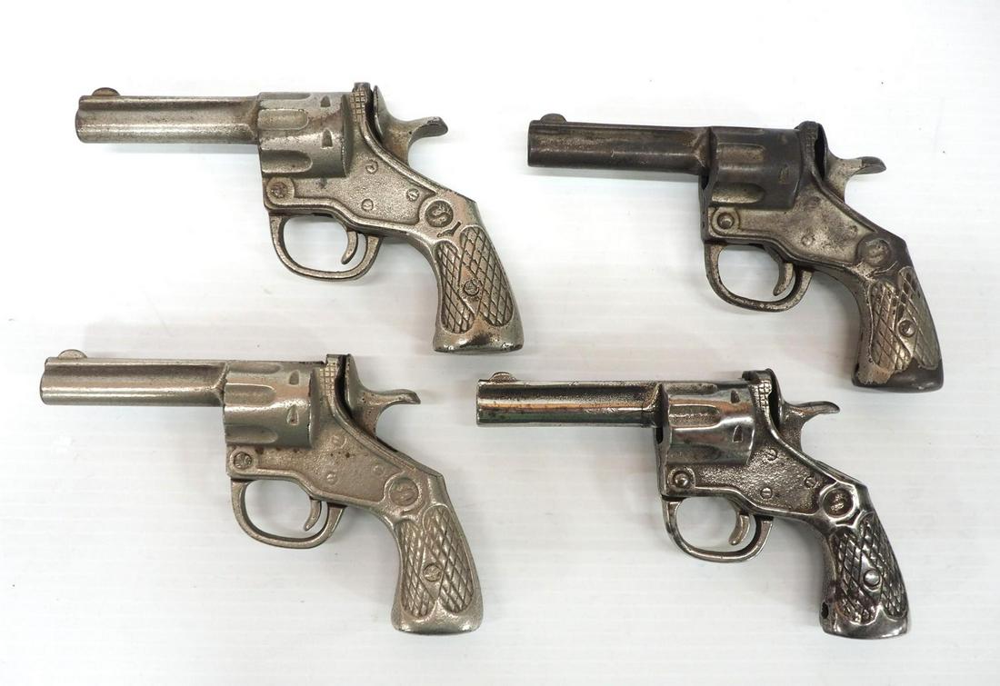 (4) Early cast metal Cap Guns: (4) Cast metal Cap Guns from the early 1960s -Good, working condition