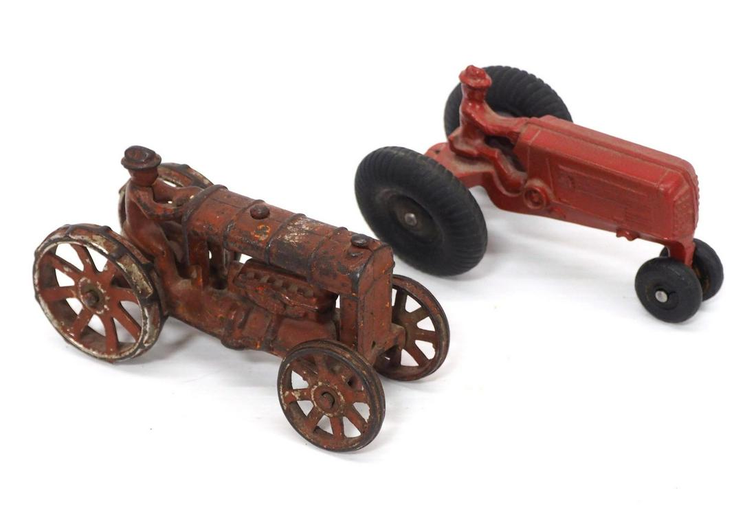 (2) Arcade cast iron tractors (1 of 3)