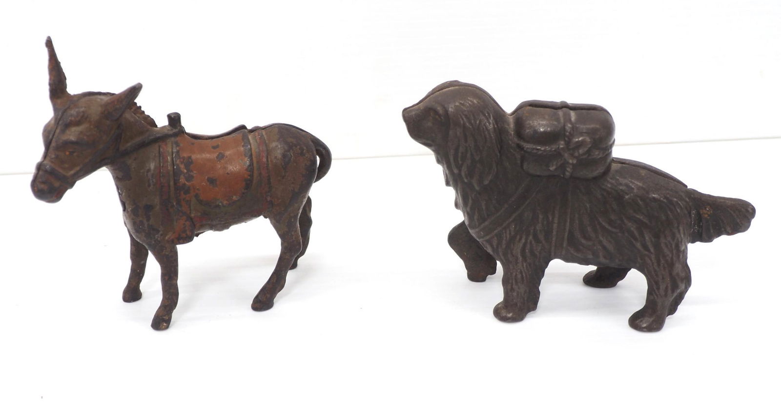 (2) Cast iron banks (1 of 5)