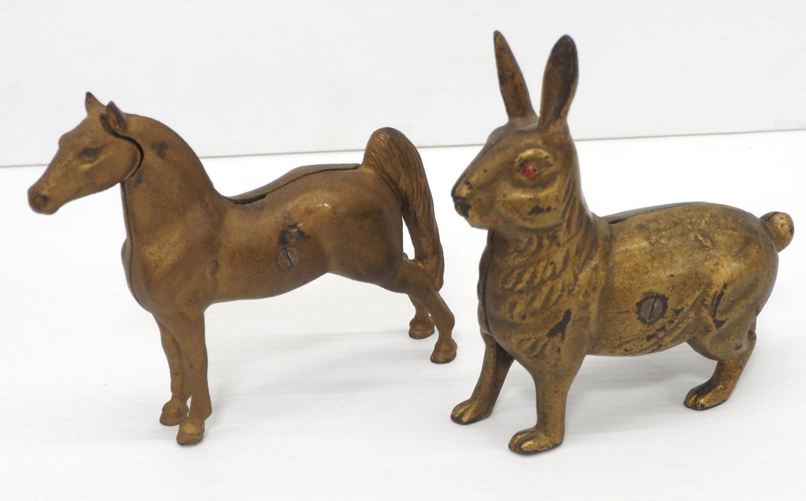 (2) Cast iron banks: (2) Cast iron banks: AC Williams Rabbit, 6¼"H / Standing Horse, 5"L -Excellent