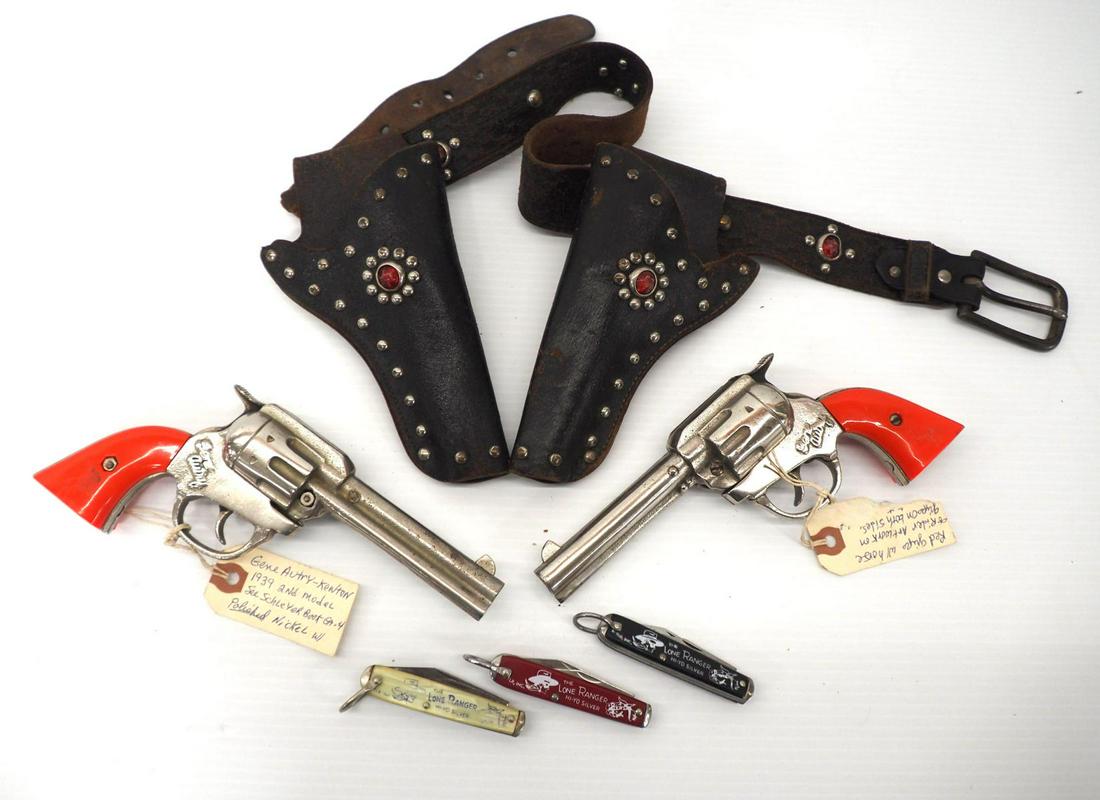 Gene Autry Cap Gun Set & Lone Ranger Pocket Knives: Kenton Gene Autry Cap Gun Set with Red Handles, all original circa 1939 / (3) Lone Ranger Pocket Knives -Good