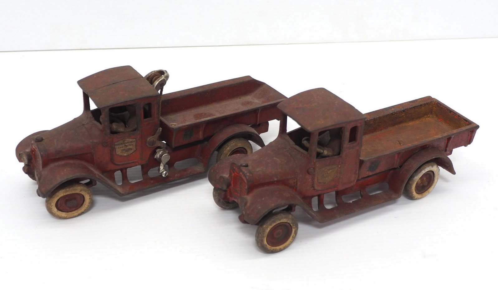 (2) Arcade Trucks: (2) Arcade Trucks: International Harvester, 10"L / International Harvester Dump, 11"L -Fair to Good