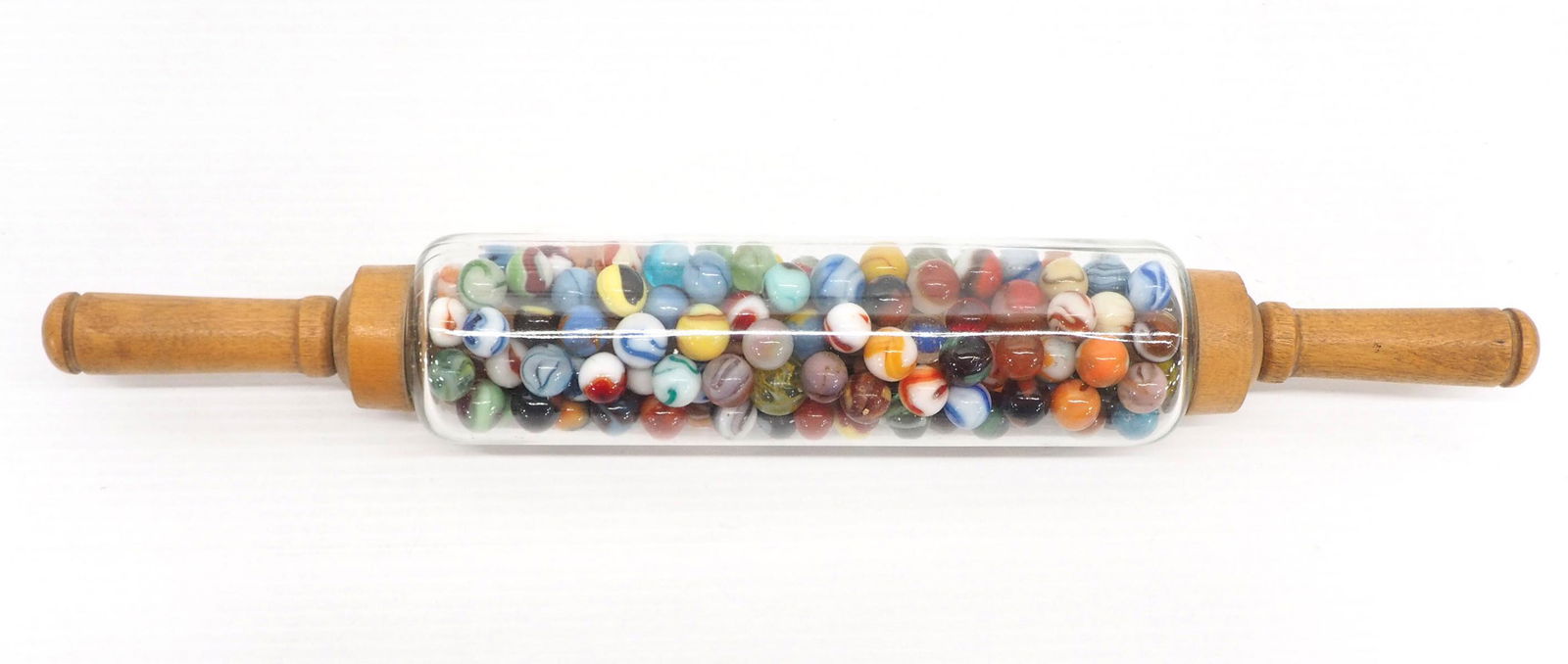 Antique glass rolling pin filled with marbles (1 of 3)