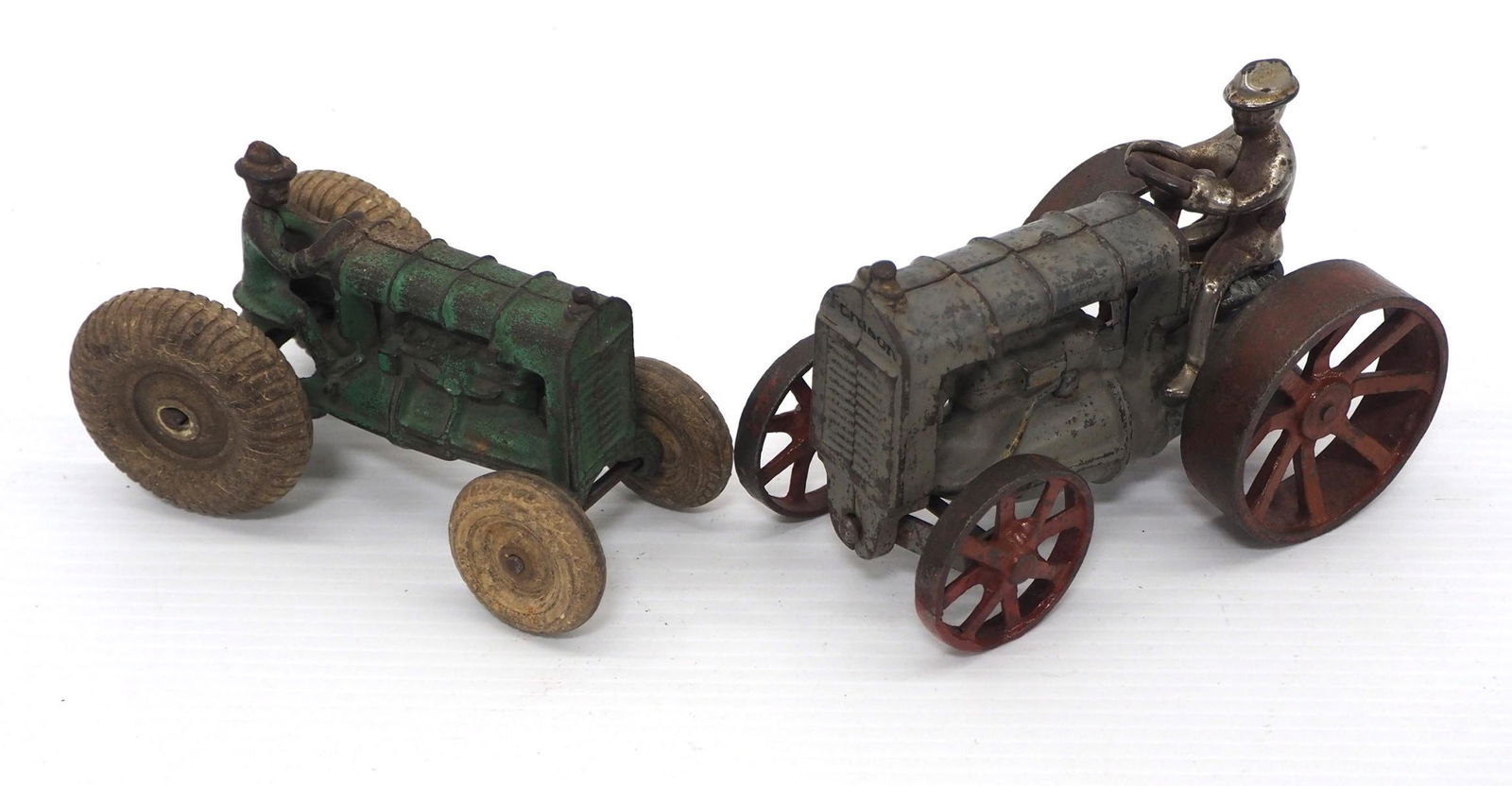 (2) Cast iron Arcade tractors (1 of 2)