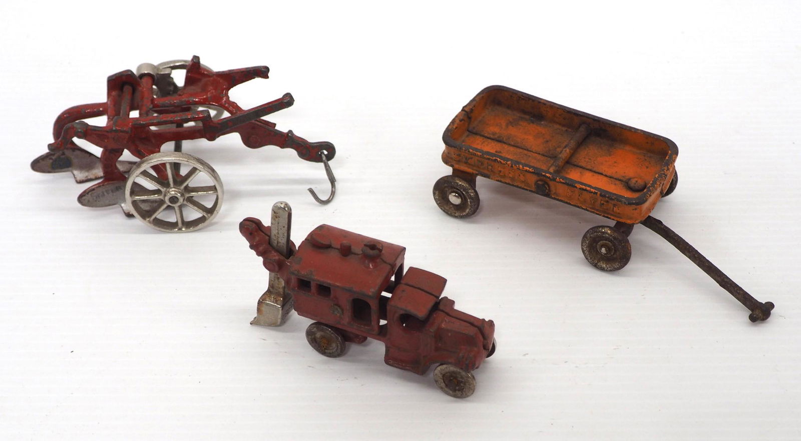(3) Cast iron toys (1 of 2)