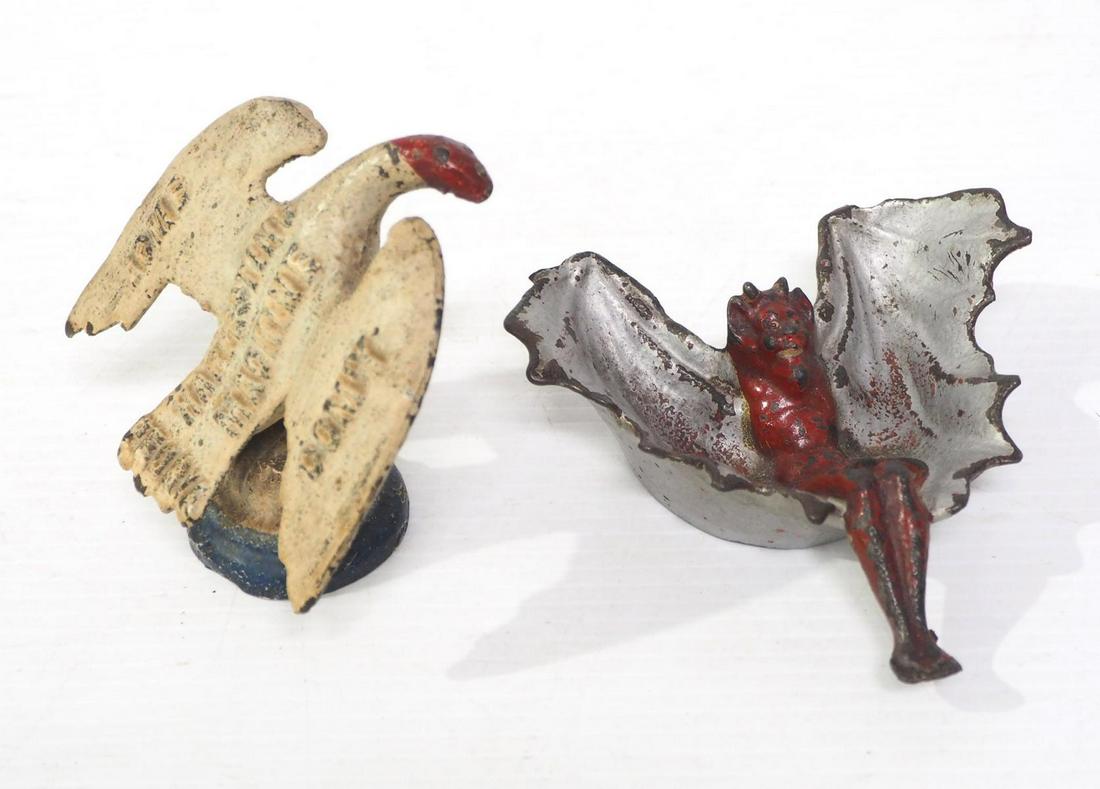 (2) Cast iron farm related advertising pieces (1 of 4)