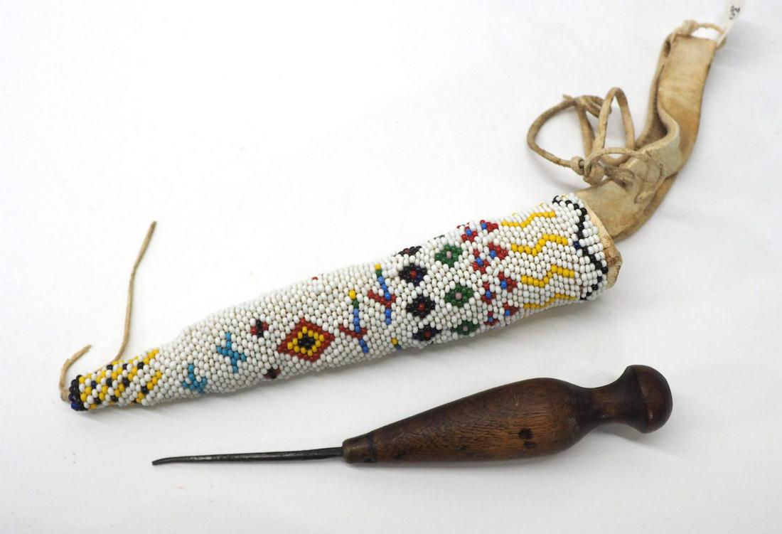 Awl with Beaded Case: Awl with Beaded Case, ORIGIN: unknown, SIZE: awl is 5-3/4" long, EX: Marko Watkins