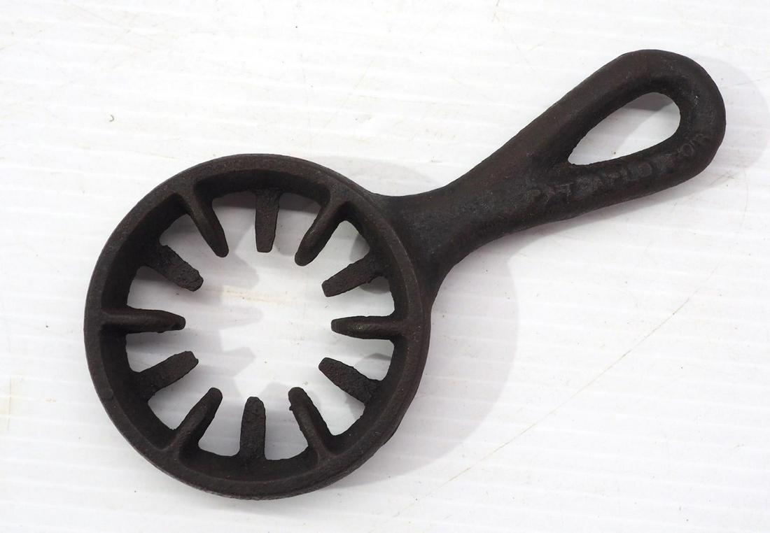 Cast iron pan-type hand corn sheller: Cast iron pan-type hand corn sheller embossed with "Pat. Appl'd For"
