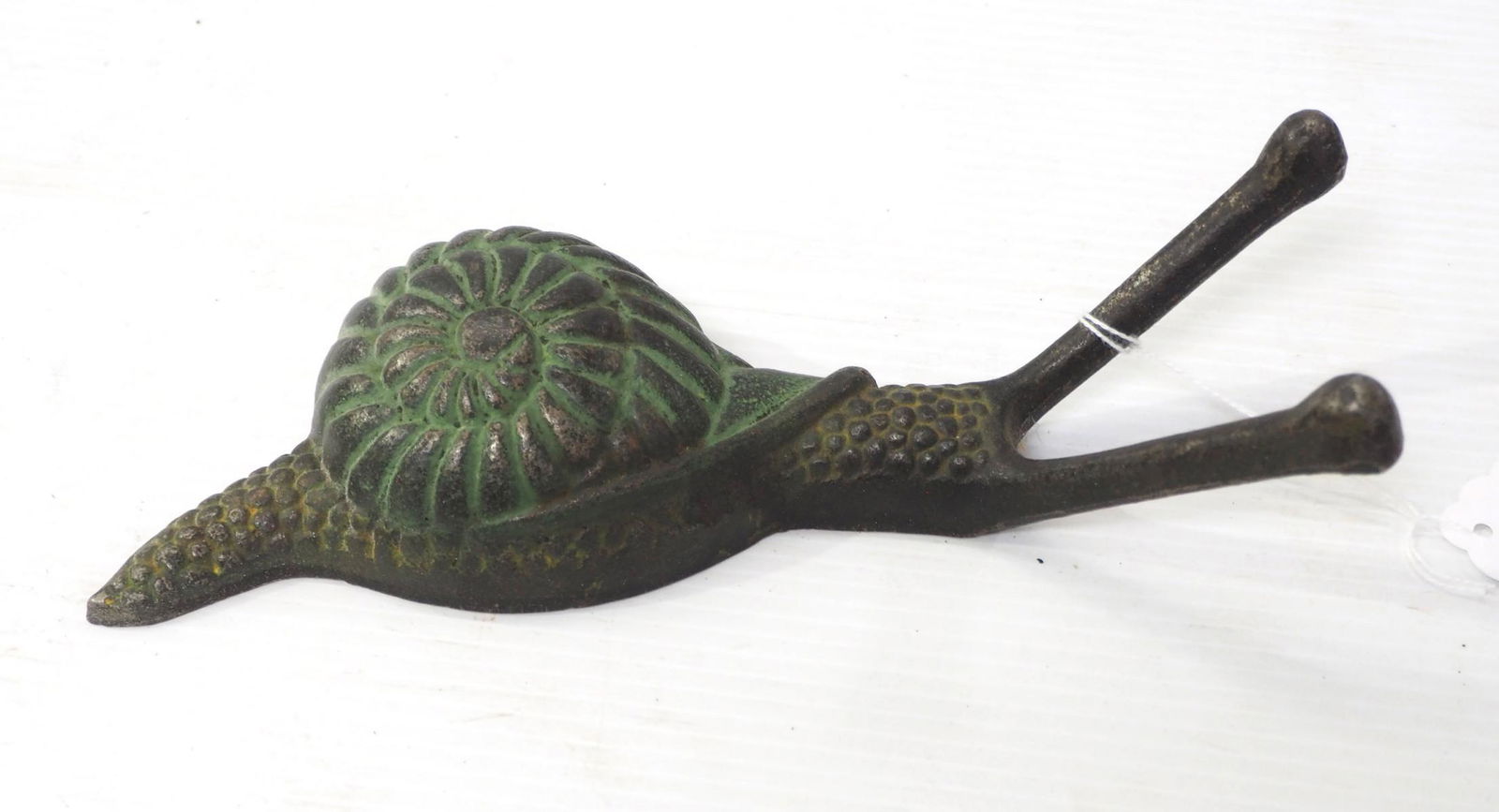 Cast iron snail-shaped boot jack (1 of 2)