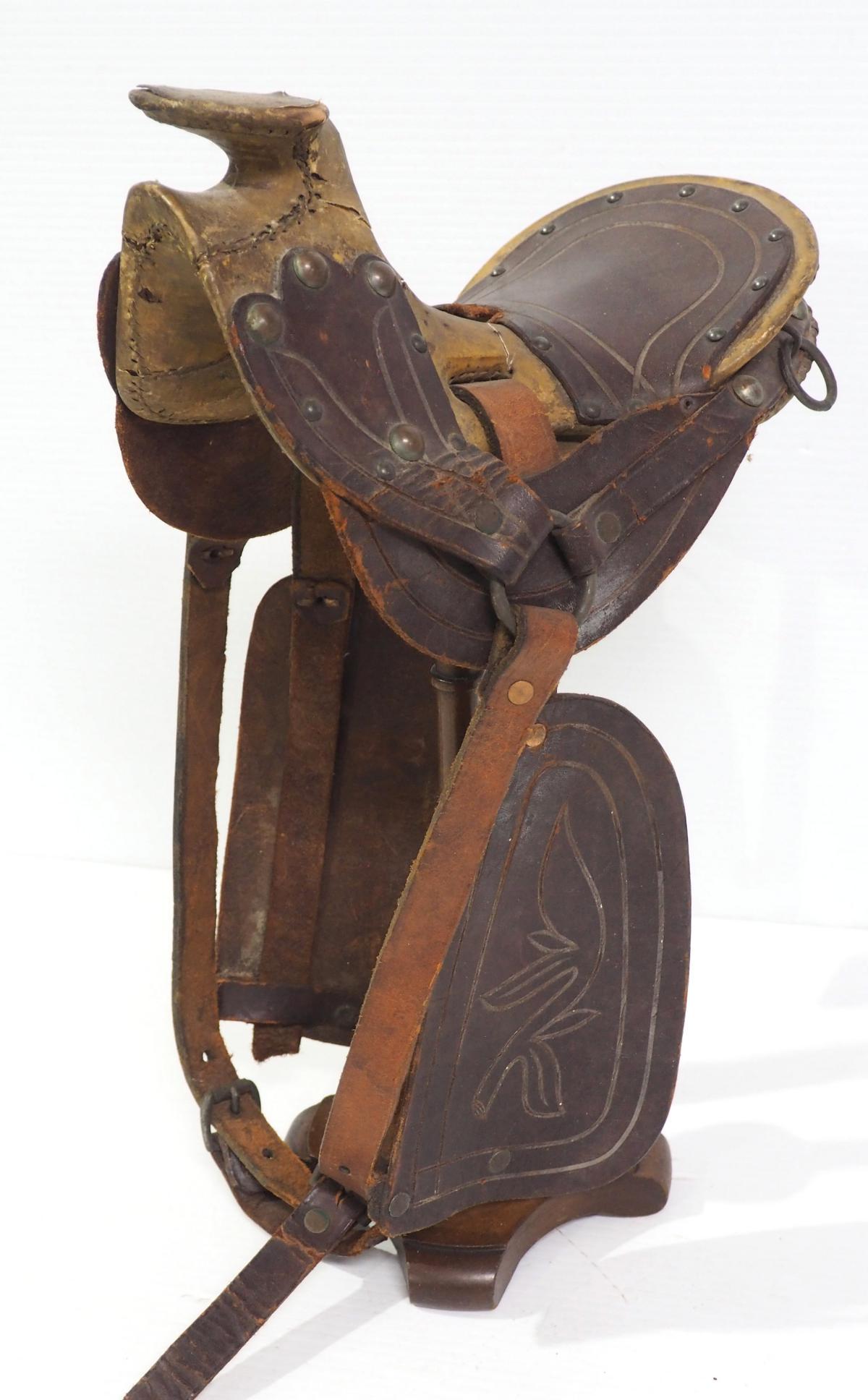 Salesman sample leather saddle on stand (1 of 5)