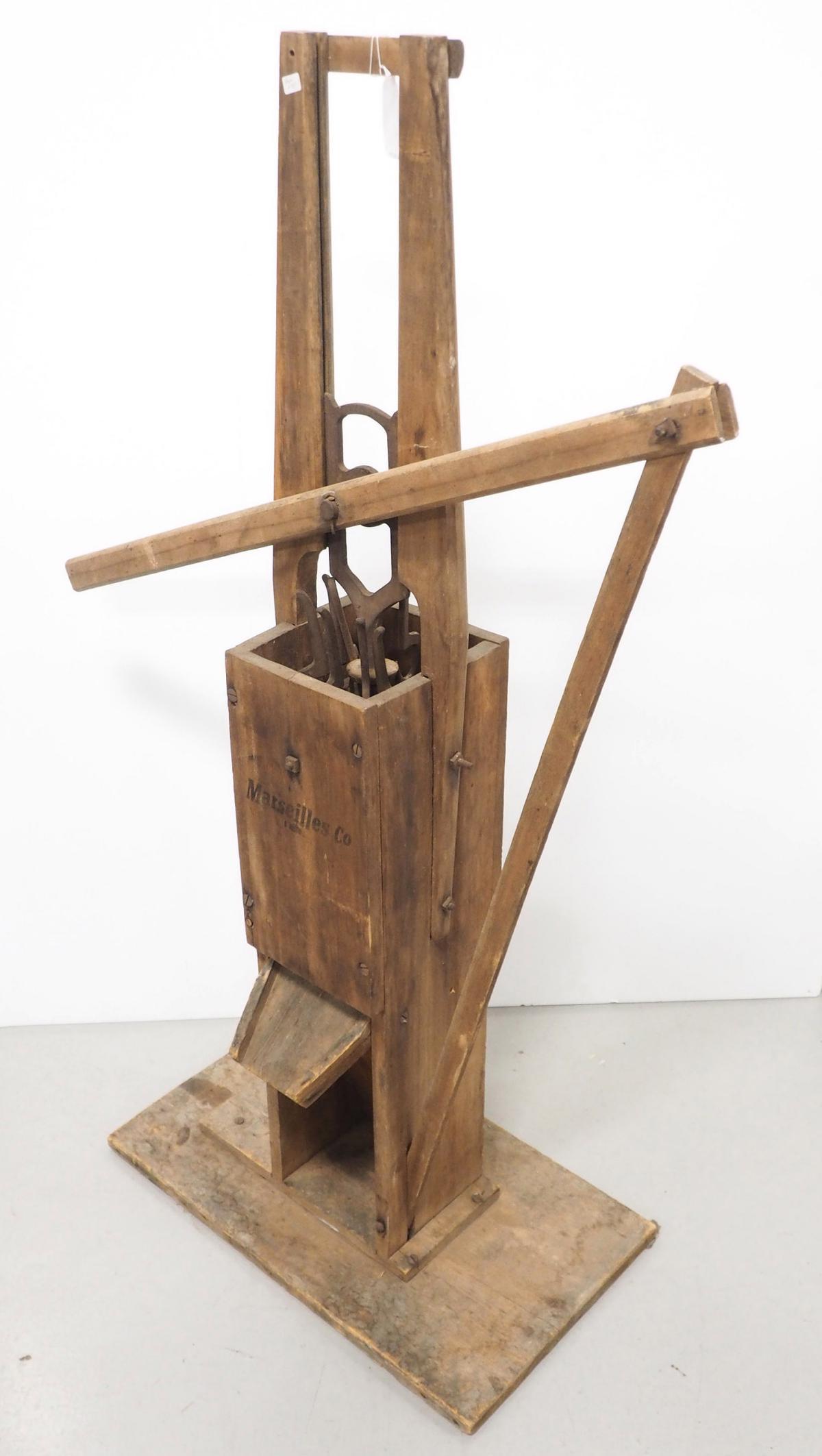 Early primitive plunger-type corn sheller (1 of 4)