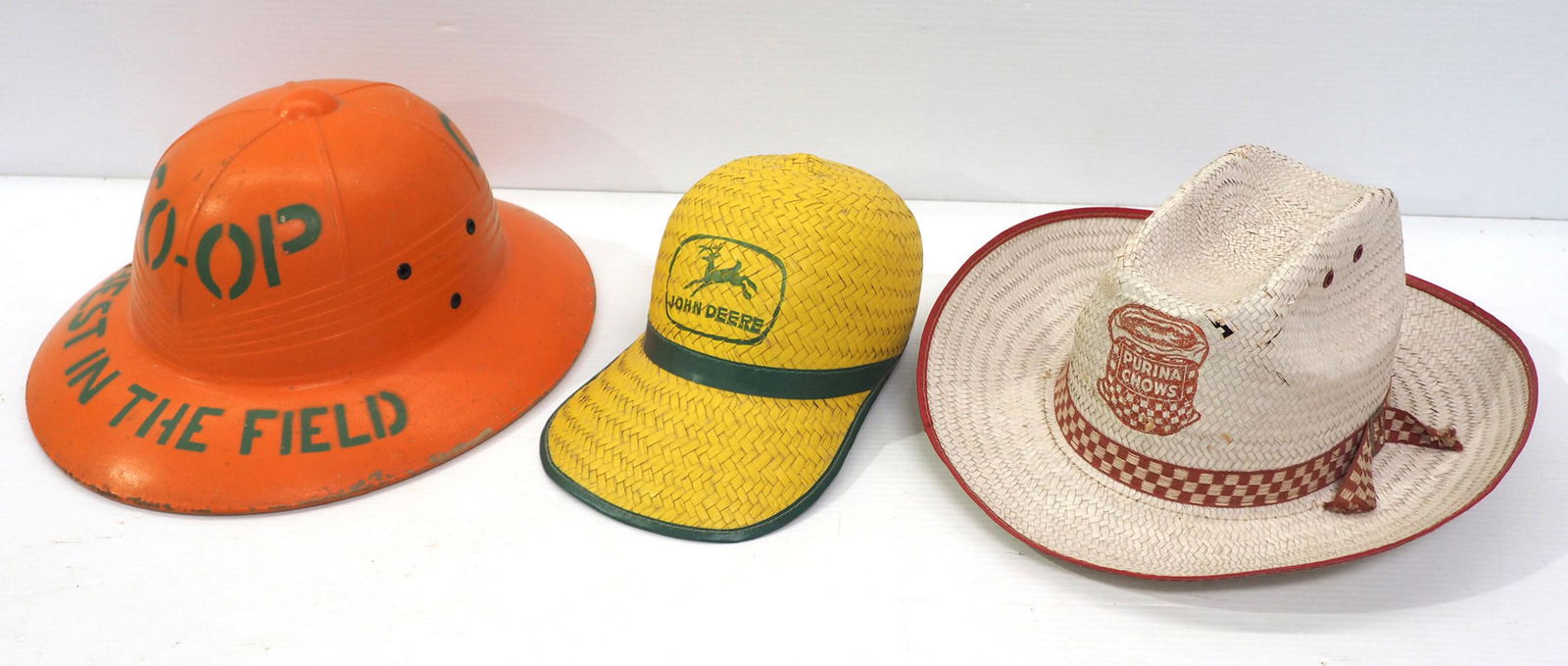 (3) Farm advertising hats: Co-op hard hat / Purina straw hat / John Deere straw hat