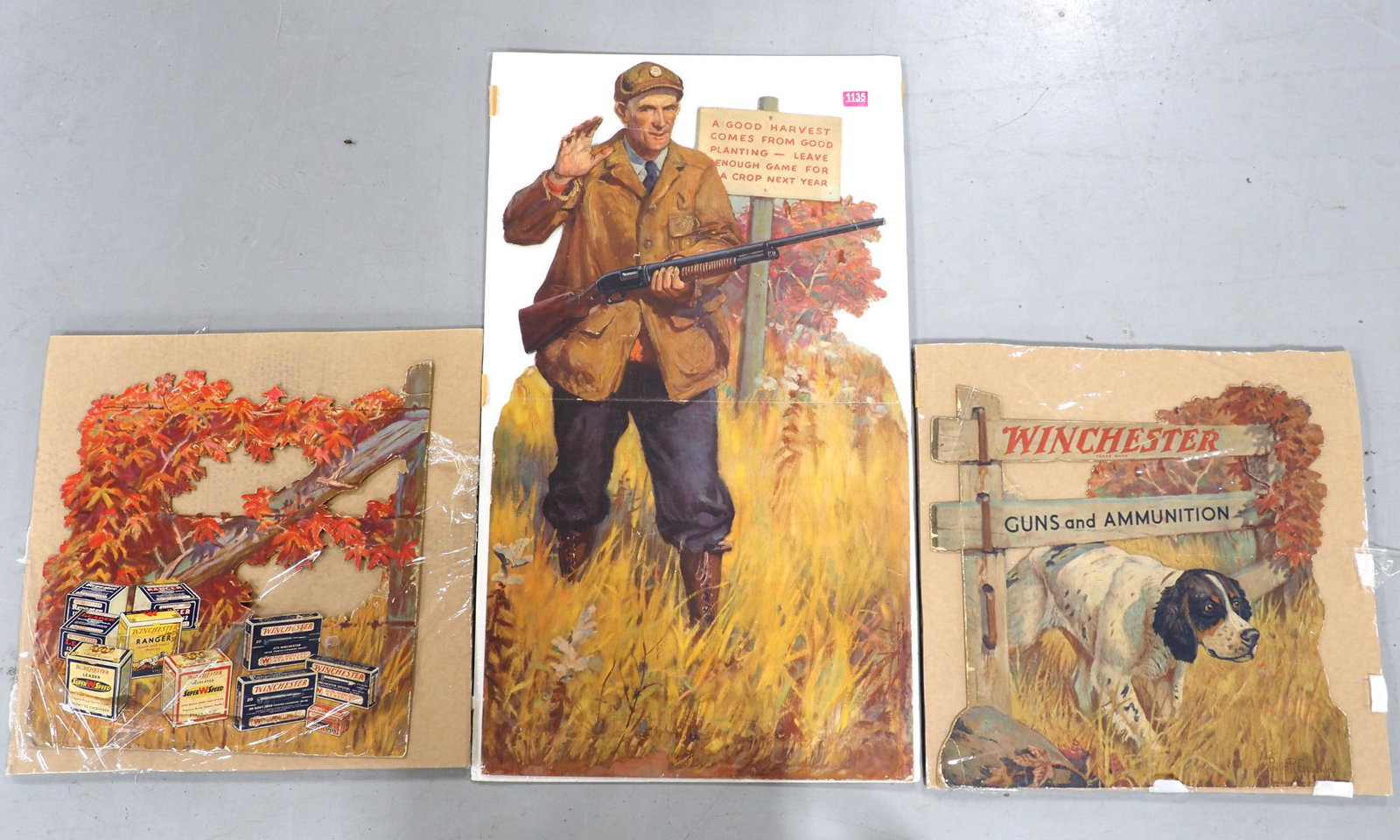 Winchester Gun & Ammunition easel backs: 6'x42" 3-pc cardboard Winchester Gun & Ammunition easel backs -Missing easels, has some tears and creasing, otherwise good