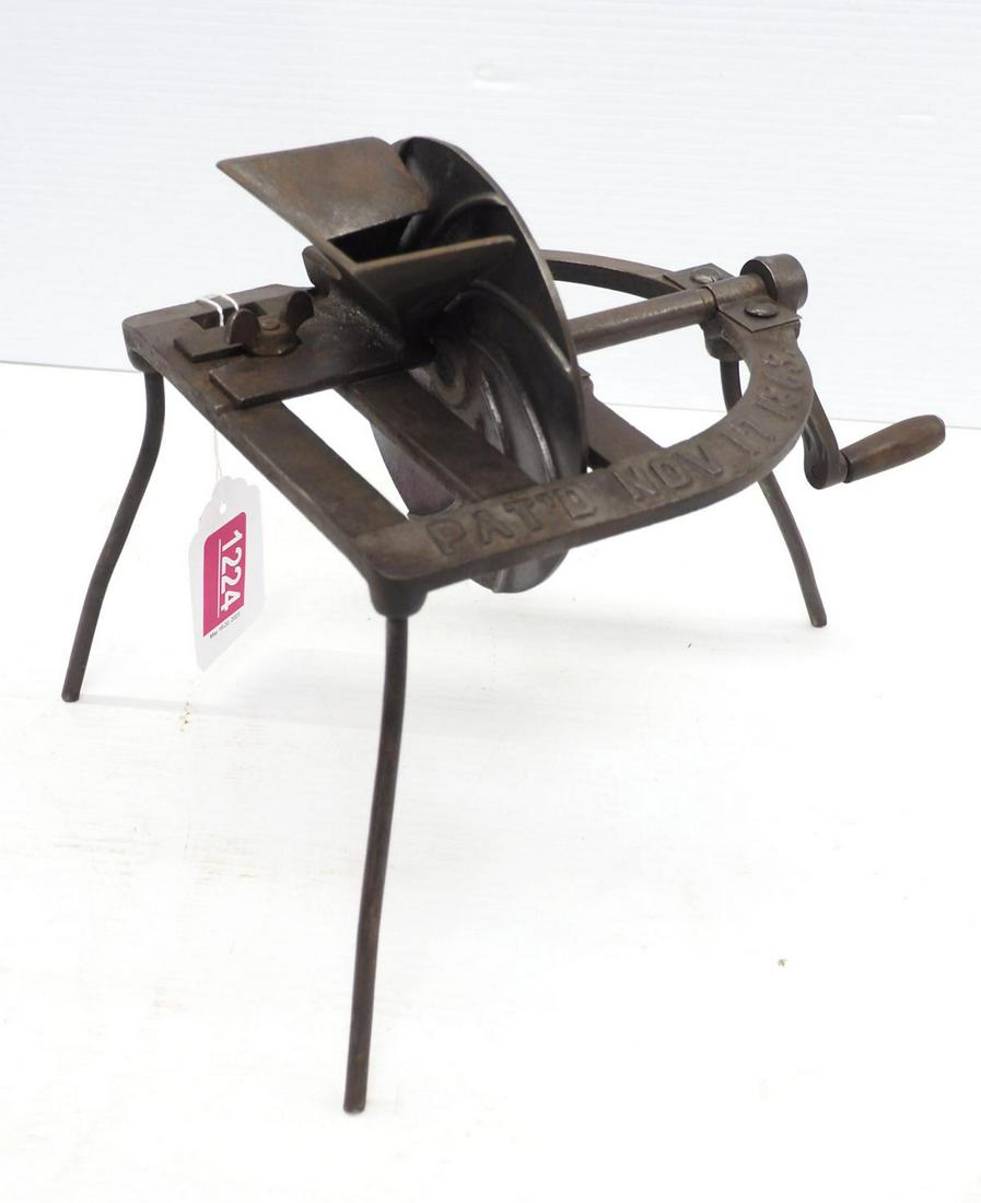 Cast iron cherry pitter (1 of 3)