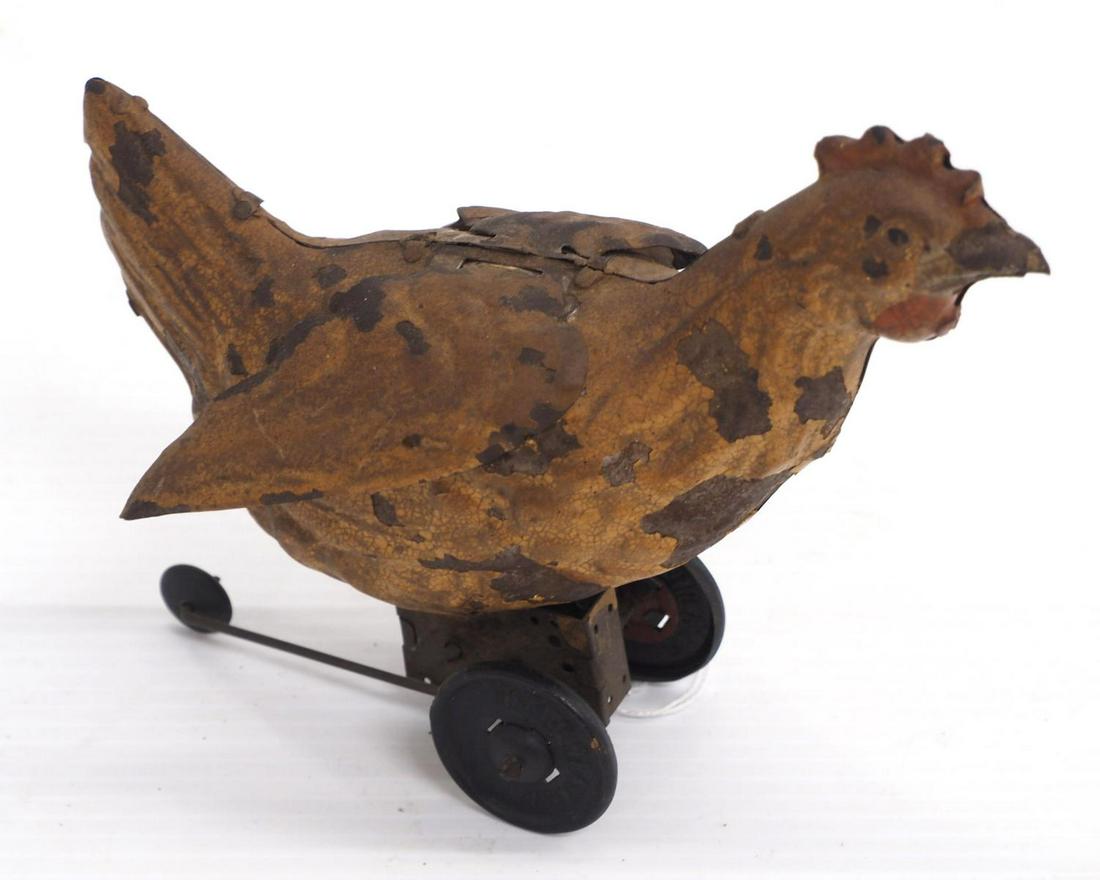 Tin wind-up chicken toy: 6"L tin wind-up chicken toy -works, rough