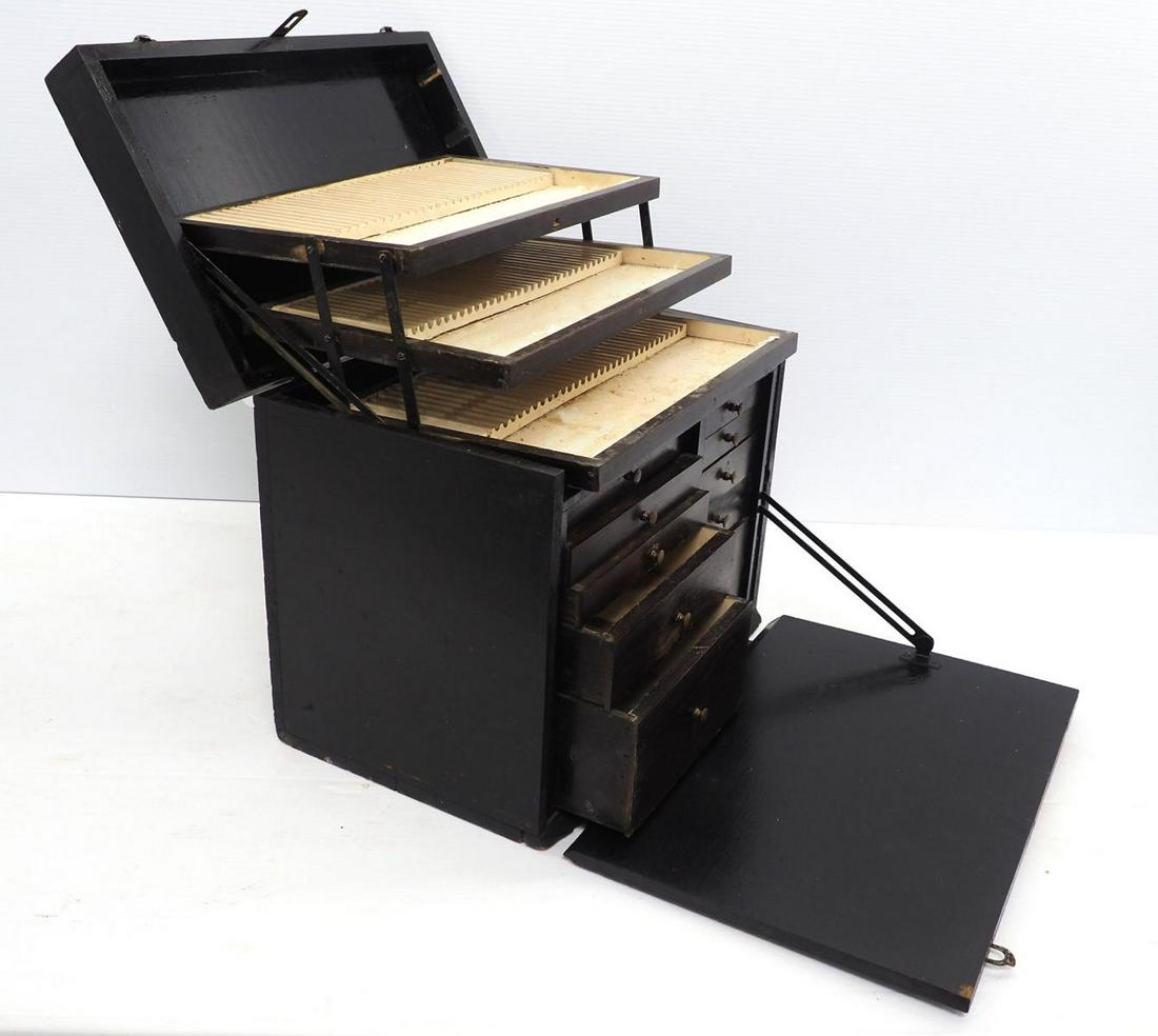 Wooden dental box: Wooden dental box, ten drawers and fold out display on top, 17"x10"14"H - This lot will be delivered to the local UPS store for professional packaging.