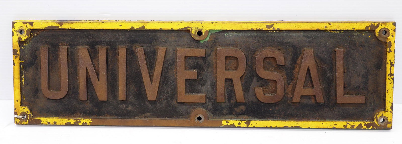 Cast iron Universal sign (1 of 2)
