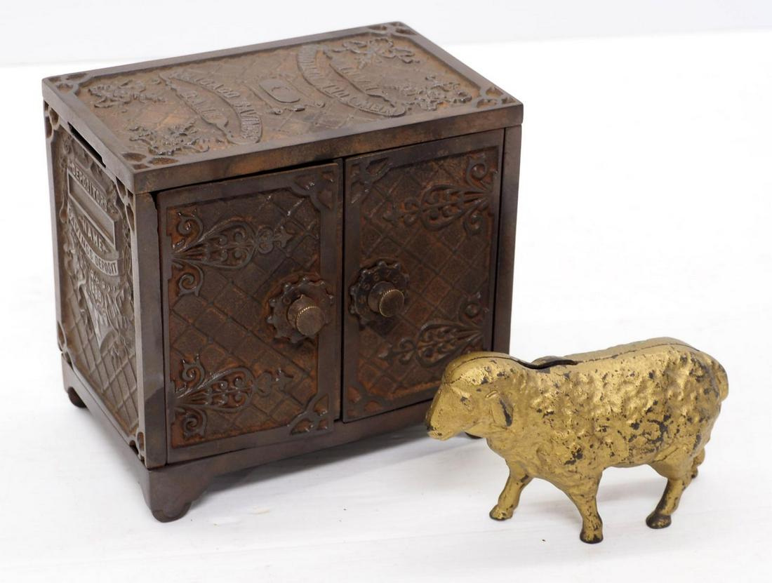 (2) Cast iron banks (1 of 6)