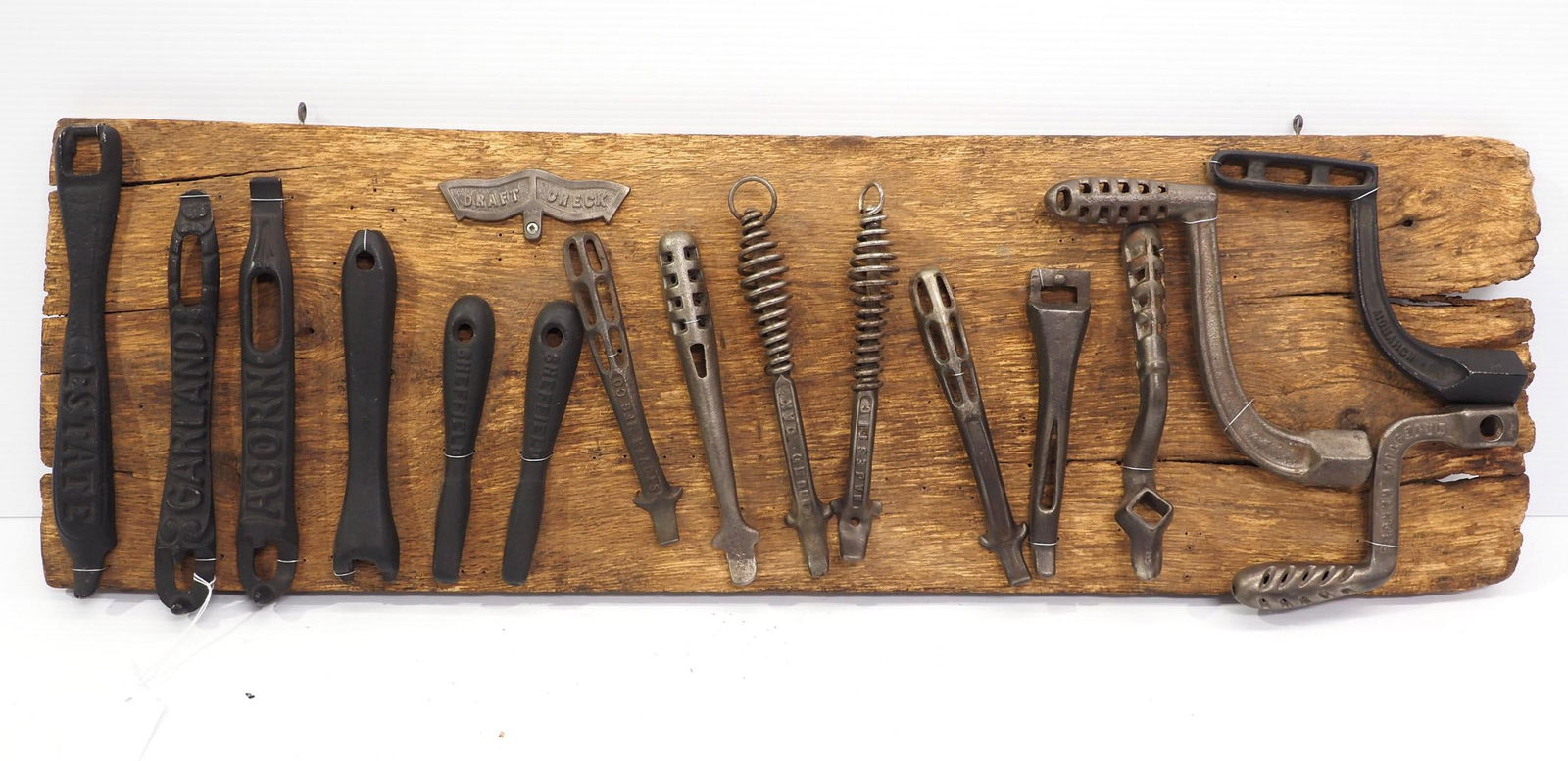 Assorted cast iron pot-lifter display (1 of 3)