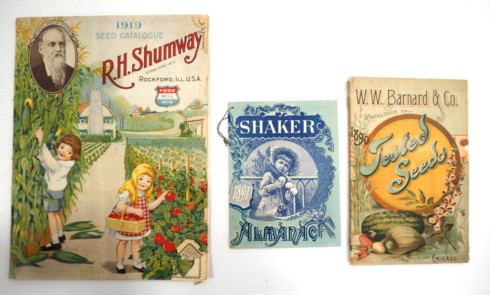 (3) Early farmers catalogs: 1919 R.H. Shumway Seed catalog, Rockford, IL, 1890 W.W. Barnard Seed catalog, and 1897 Shaker Almanac